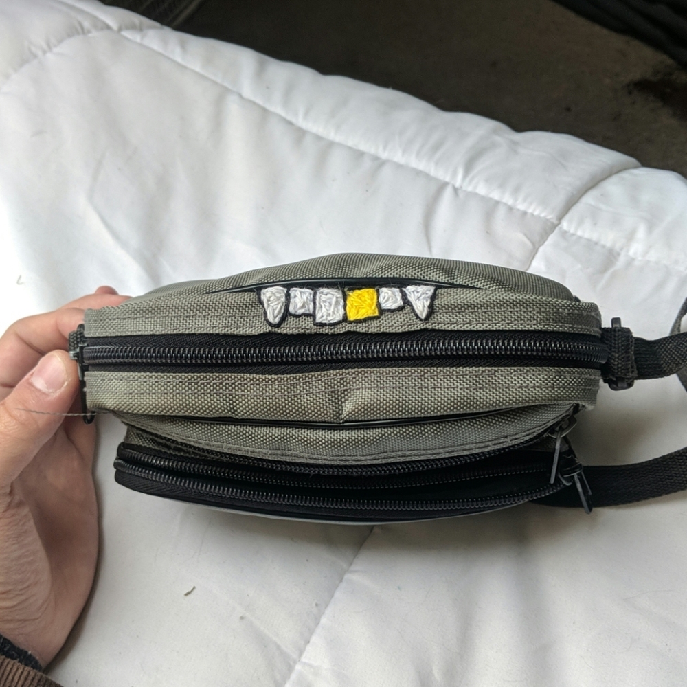Hand-embroidered camera bag. Gold Tooth.